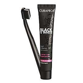 Curaprox Black is White з активованим вугіллям, гідроксиапатитом, фтором, ферментами, 90 мл. У комплекті щітка